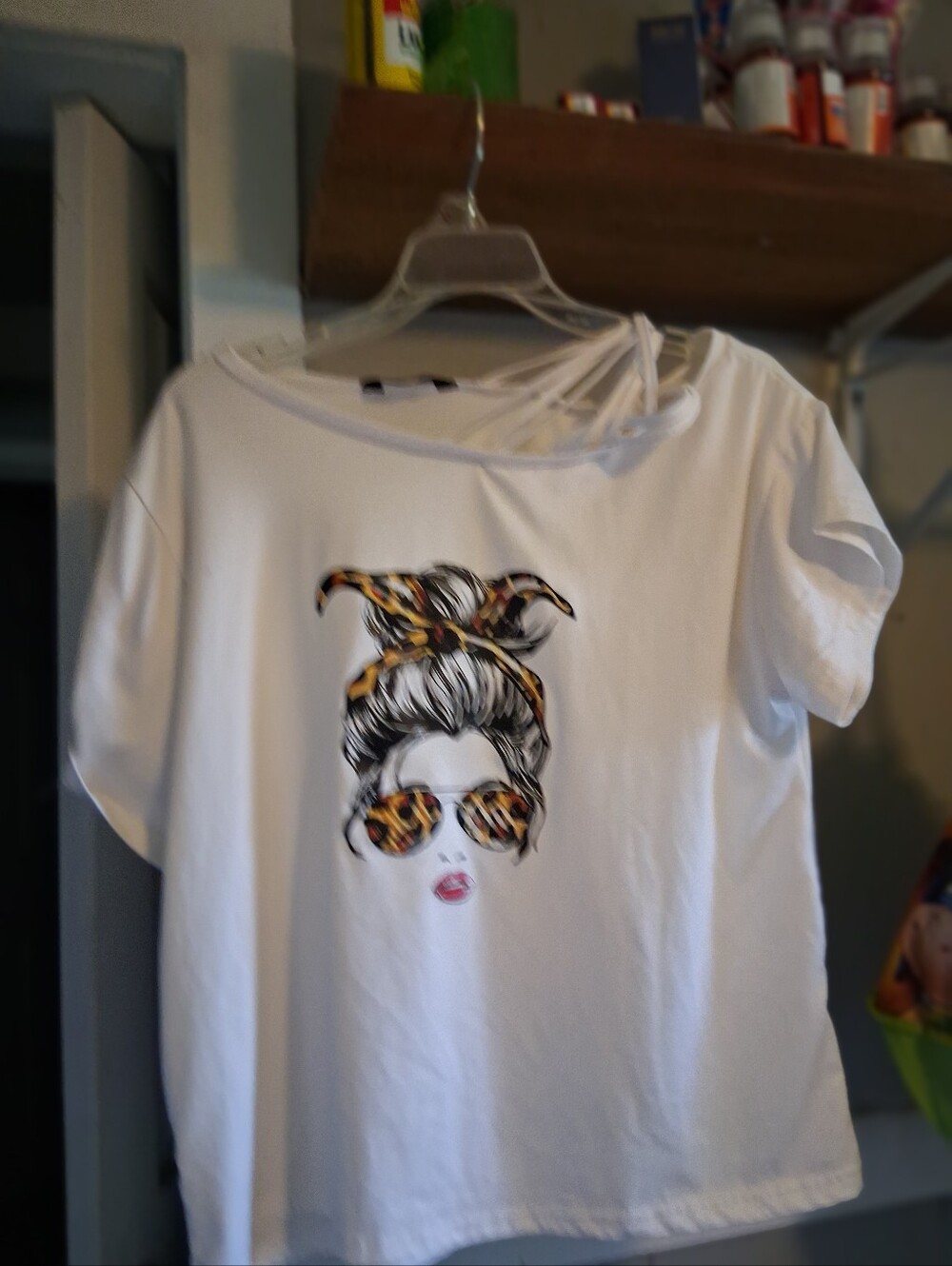 ChicMe Womenโs White Graphic Tee with Leopard Accent